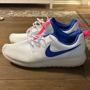 Nike White Sneakers with Blue Swoosh and Pink Accents